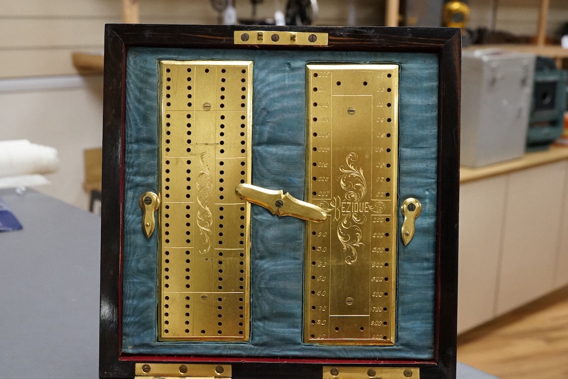 A Victorian Coromandel, brass and agate mounted games compendium, containing bezique and whist markers bone counters and inset ivory indicators, box 19cm x 19cm CITES Submission reference 3DY474P3